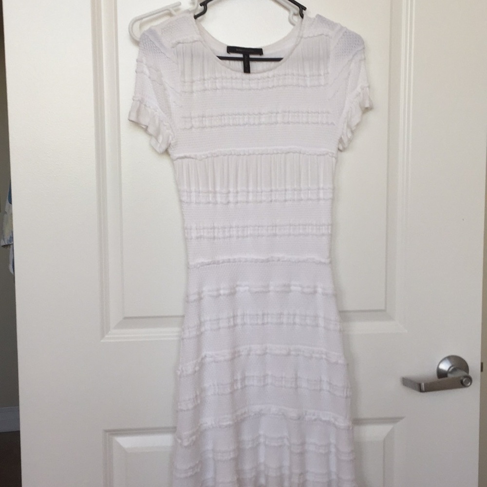 White ruffle body con dress